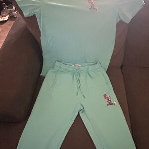 Blue space jam sweat suit. Pants is a medium and shirt is a large